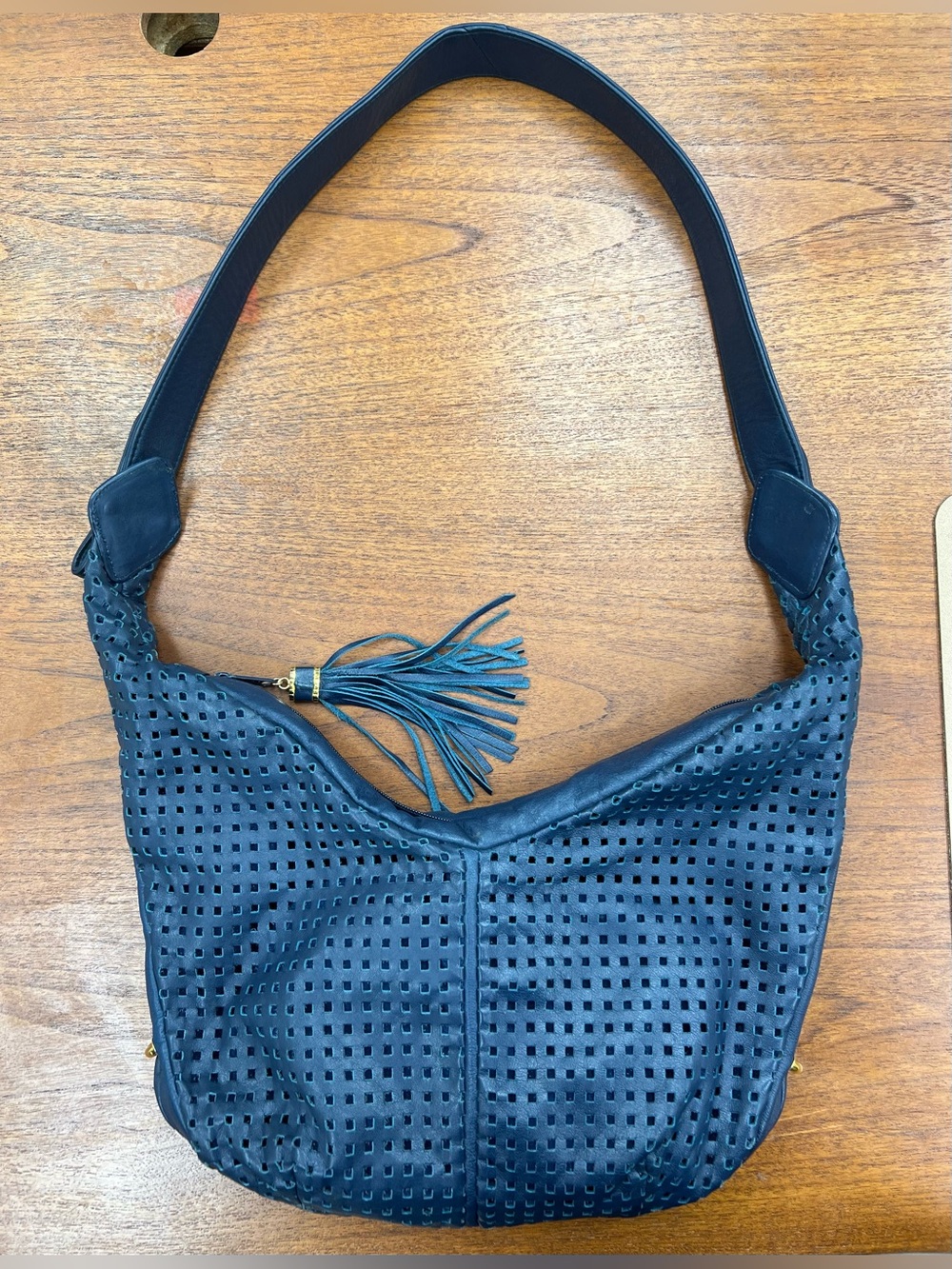 Brio Perforated Navy Leather Shoulder Bag with Tassel Detail